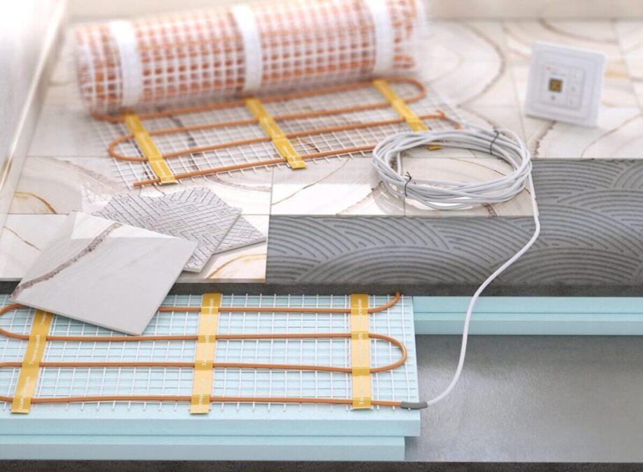 Un sistema de suelo radiante compuesto por alfombrillas calefactoras y baldosas cerámicas.